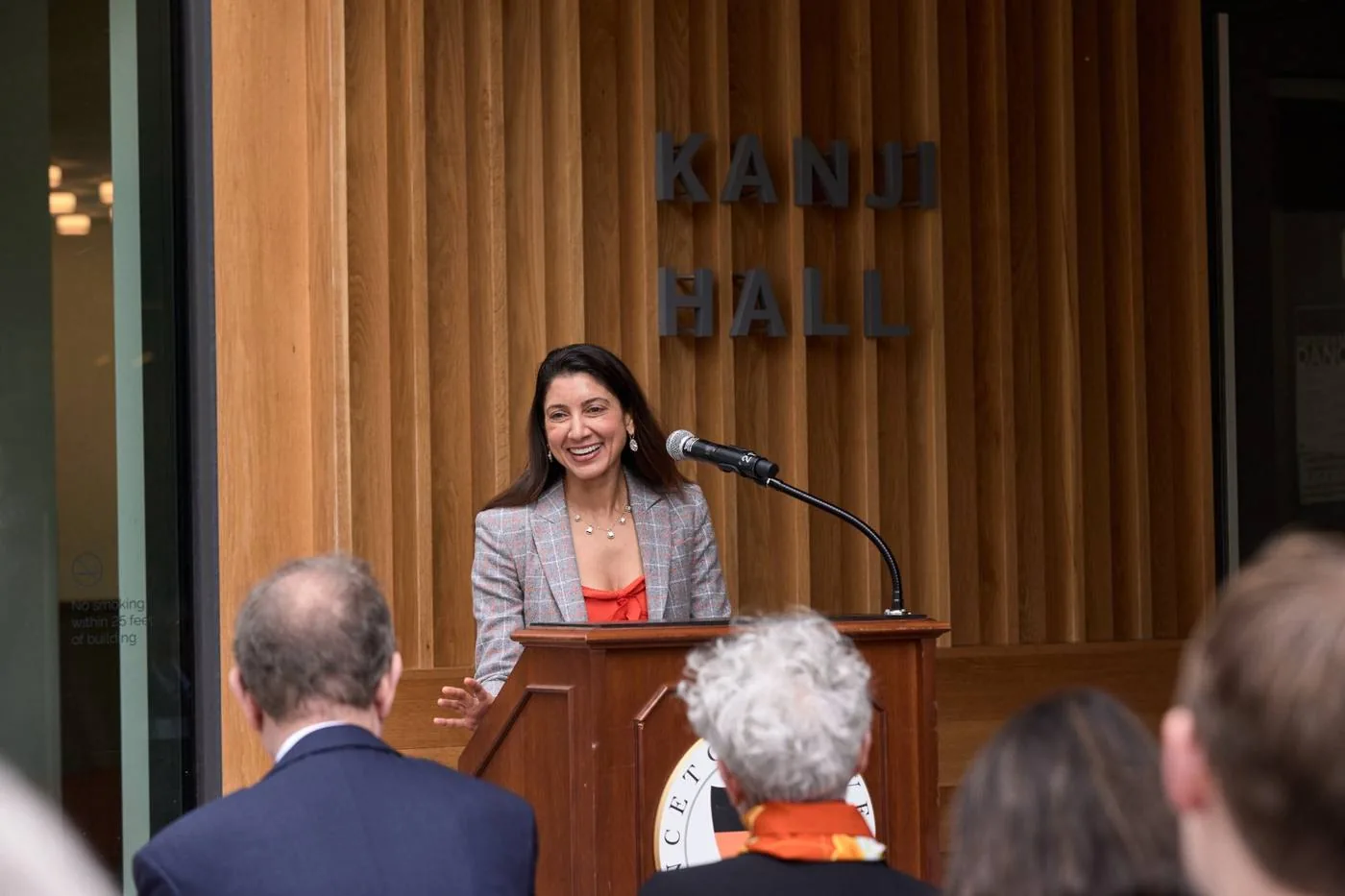 Aliya speaking at the opening of Kanji Hall