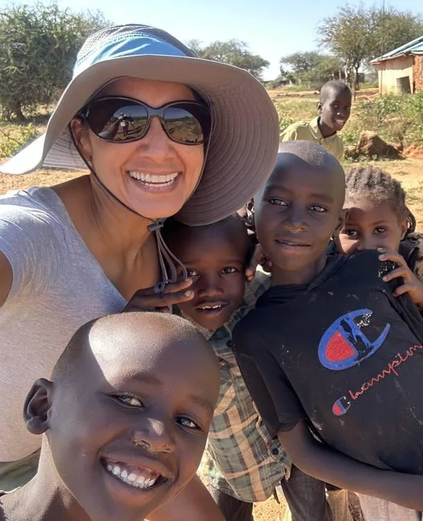Aliya with children in Kenya
