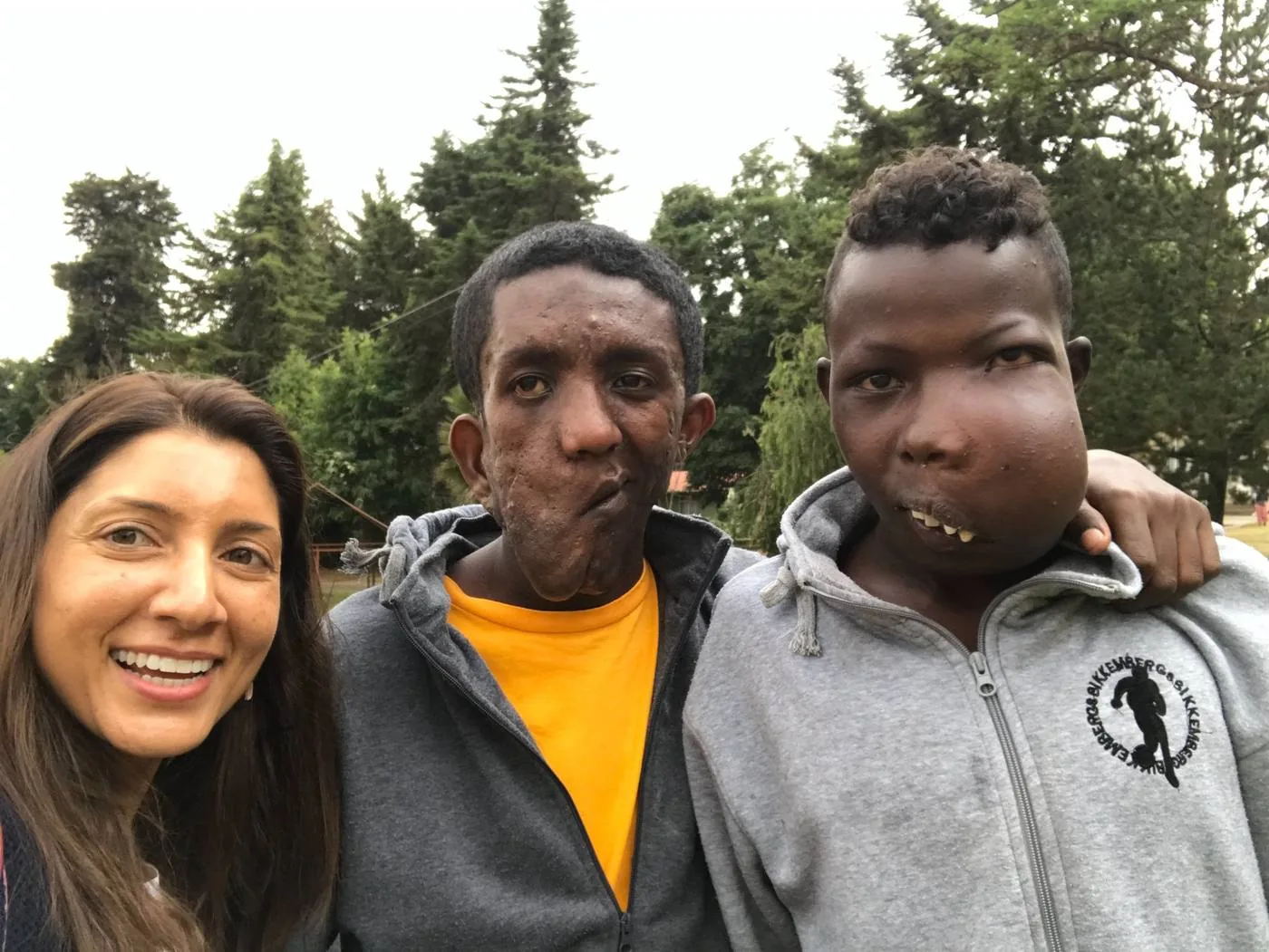 Aliya with two friends during a field visit
